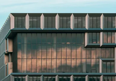 Modern office building under bright sky