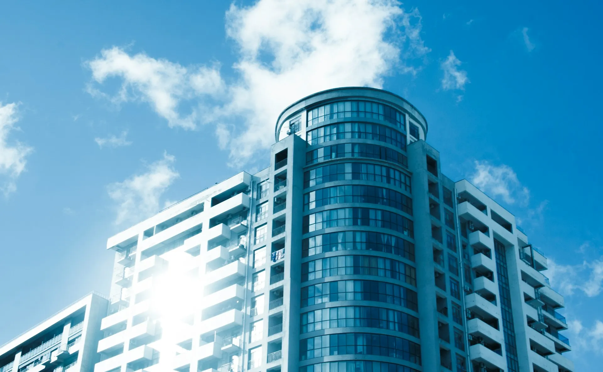 Modern office building under bright sky