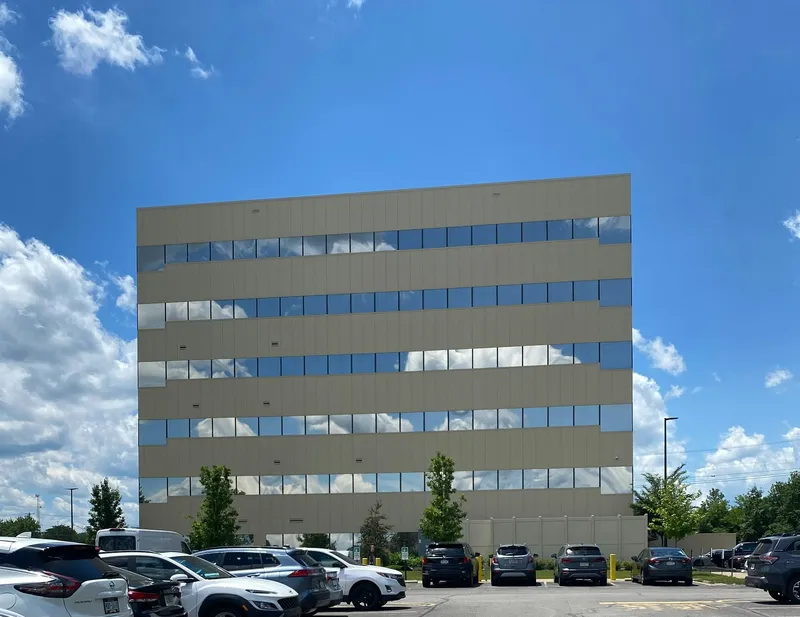 Modern office building under clear sky