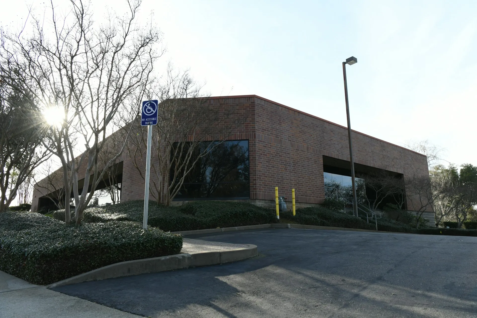 Modern office building under bright sky