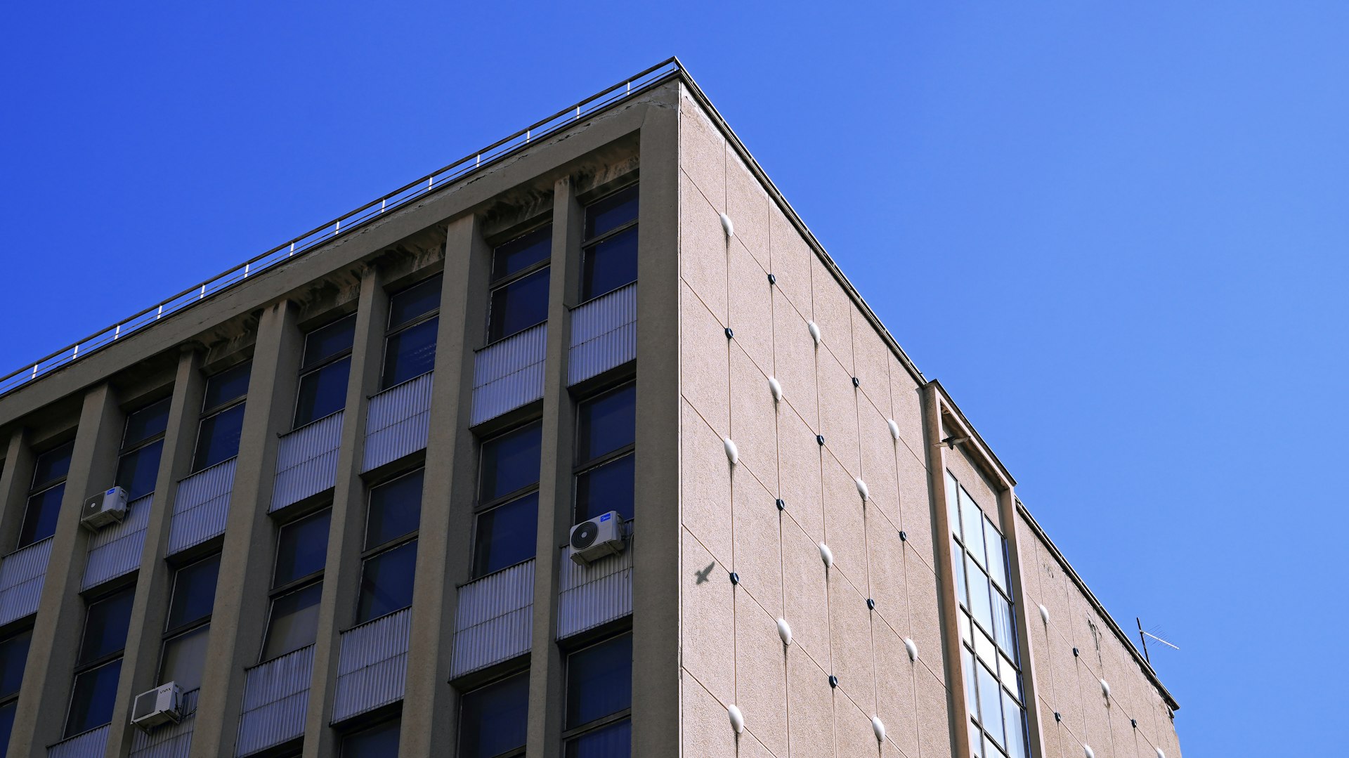 Modern office building under clear sky