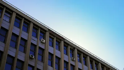 Modern office building under clear sky