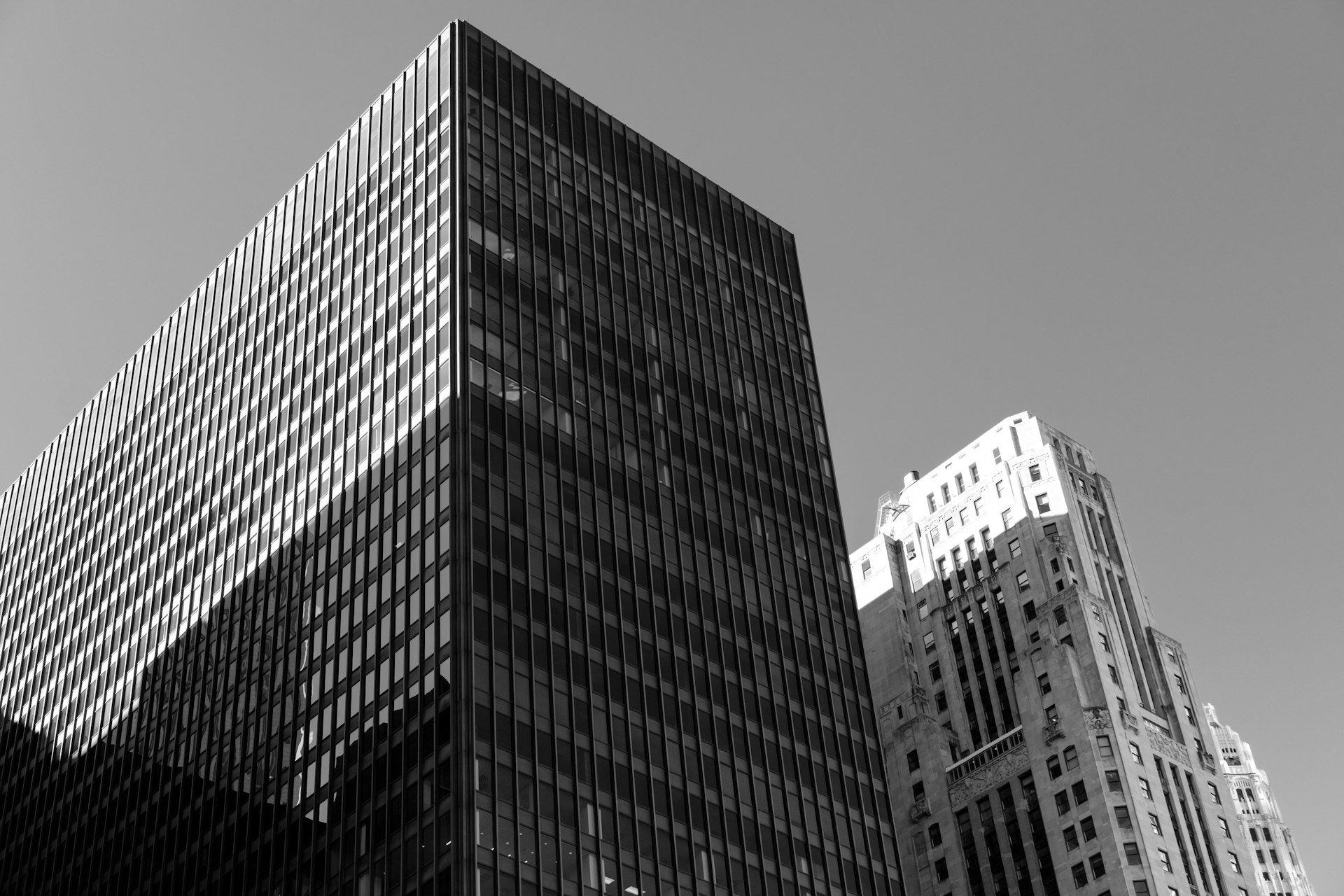 A collection of diverse city buildings, representing varied real estate tokenization business models.