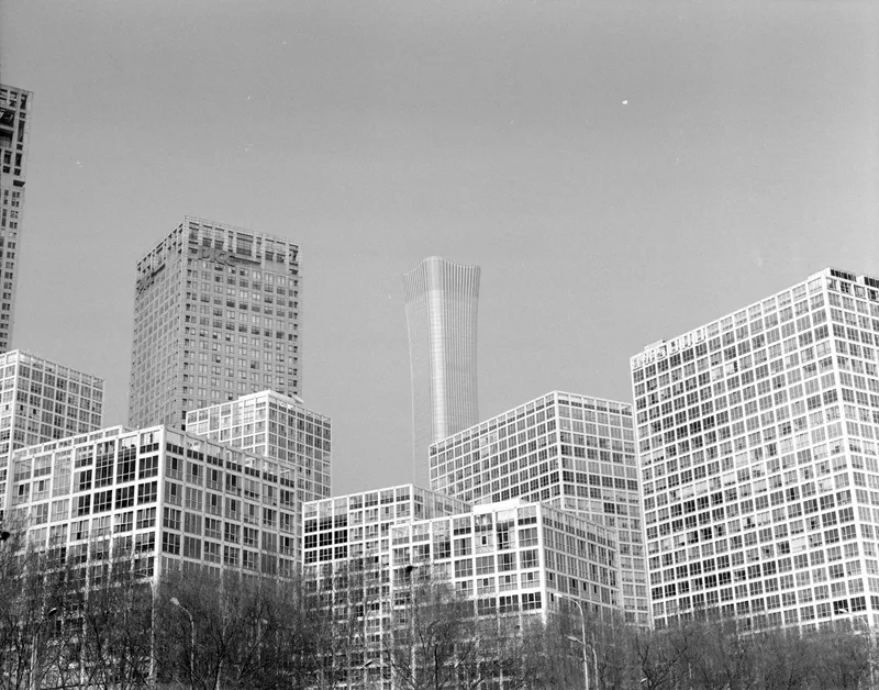 Modern skyscraper against blue sky