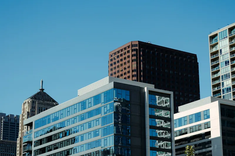 Modern office building under clear blue sky