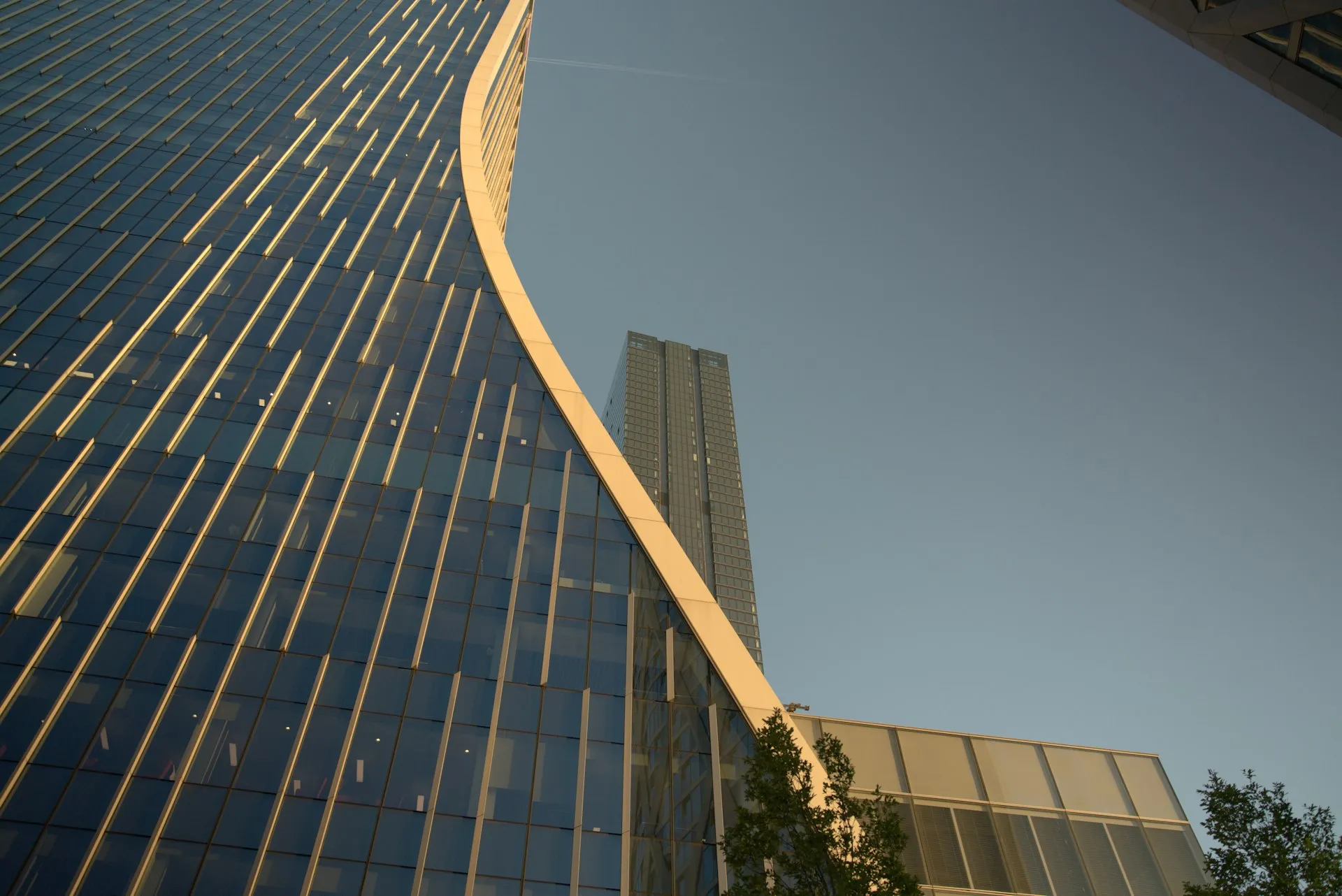 Modern skyscraper under bright sunlight