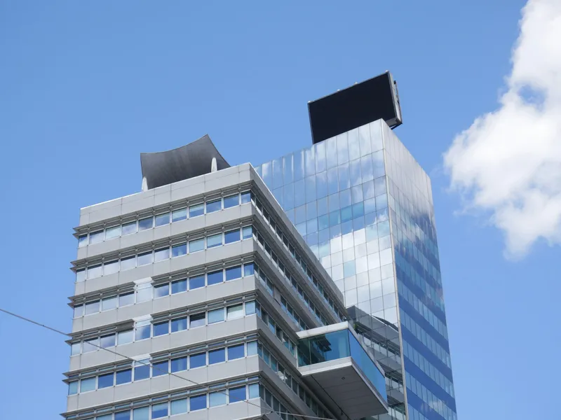 Modern office building under blue sky