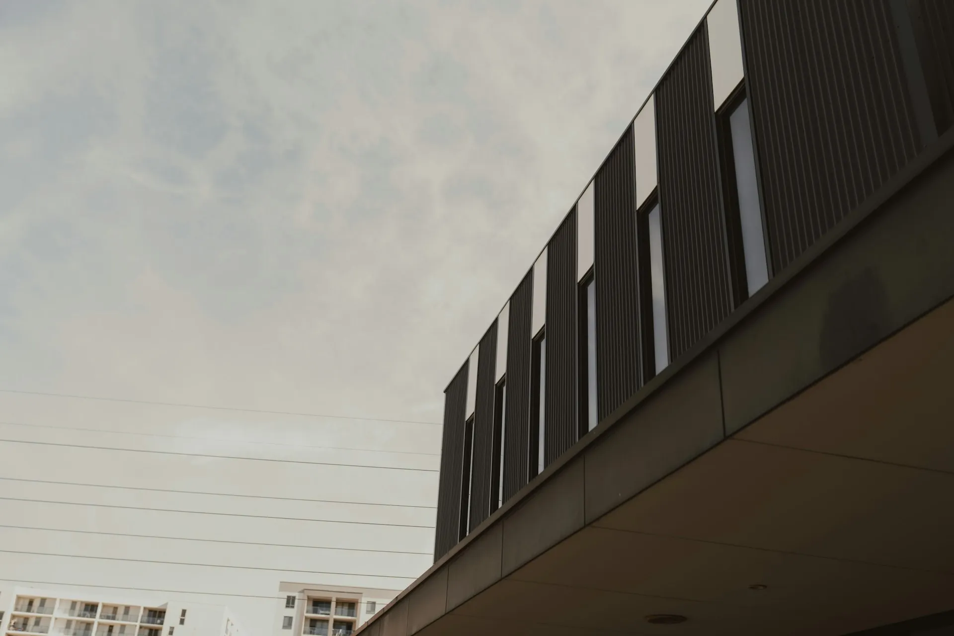 Modern office building under bright sky
