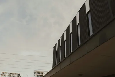 Modern office building under bright sky