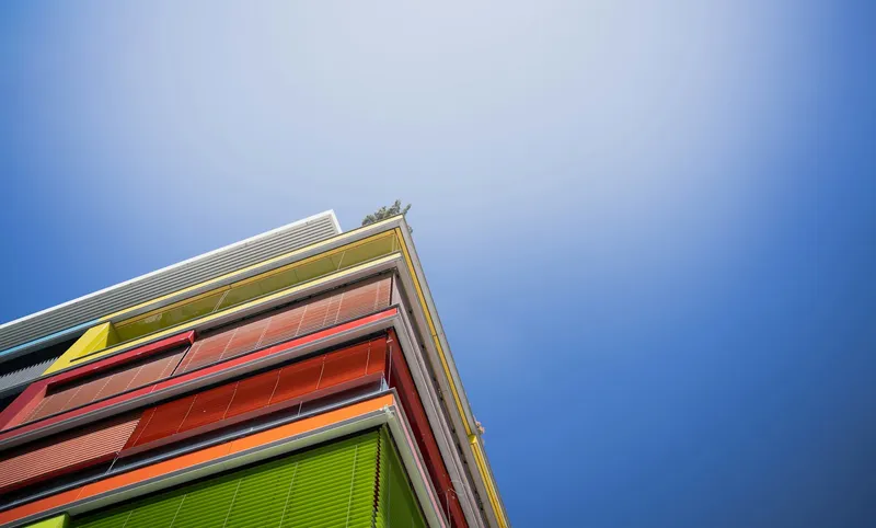 Modern office building under blue sky