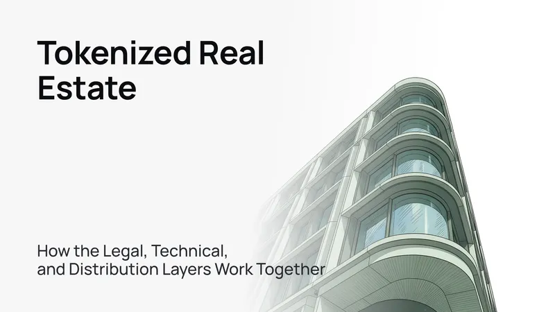 A sleek, modern office building standing tall against a clear blue sky.