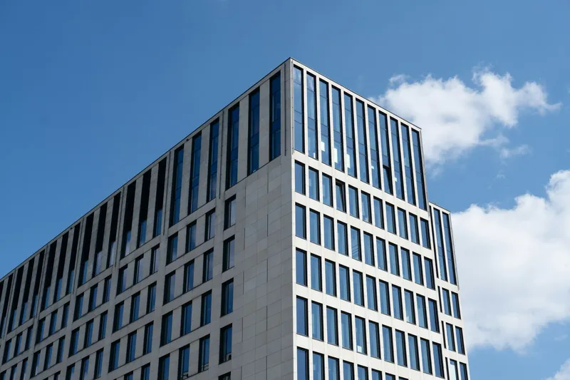 Modern office building under blue sky