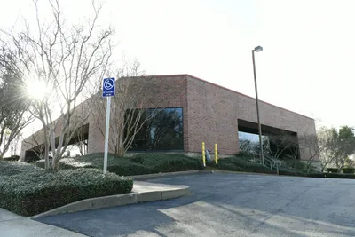 Modern office building under bright sunlight