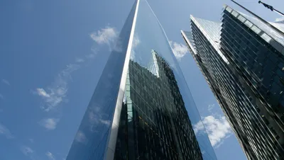 Modern skyscraper reflecting sunlight