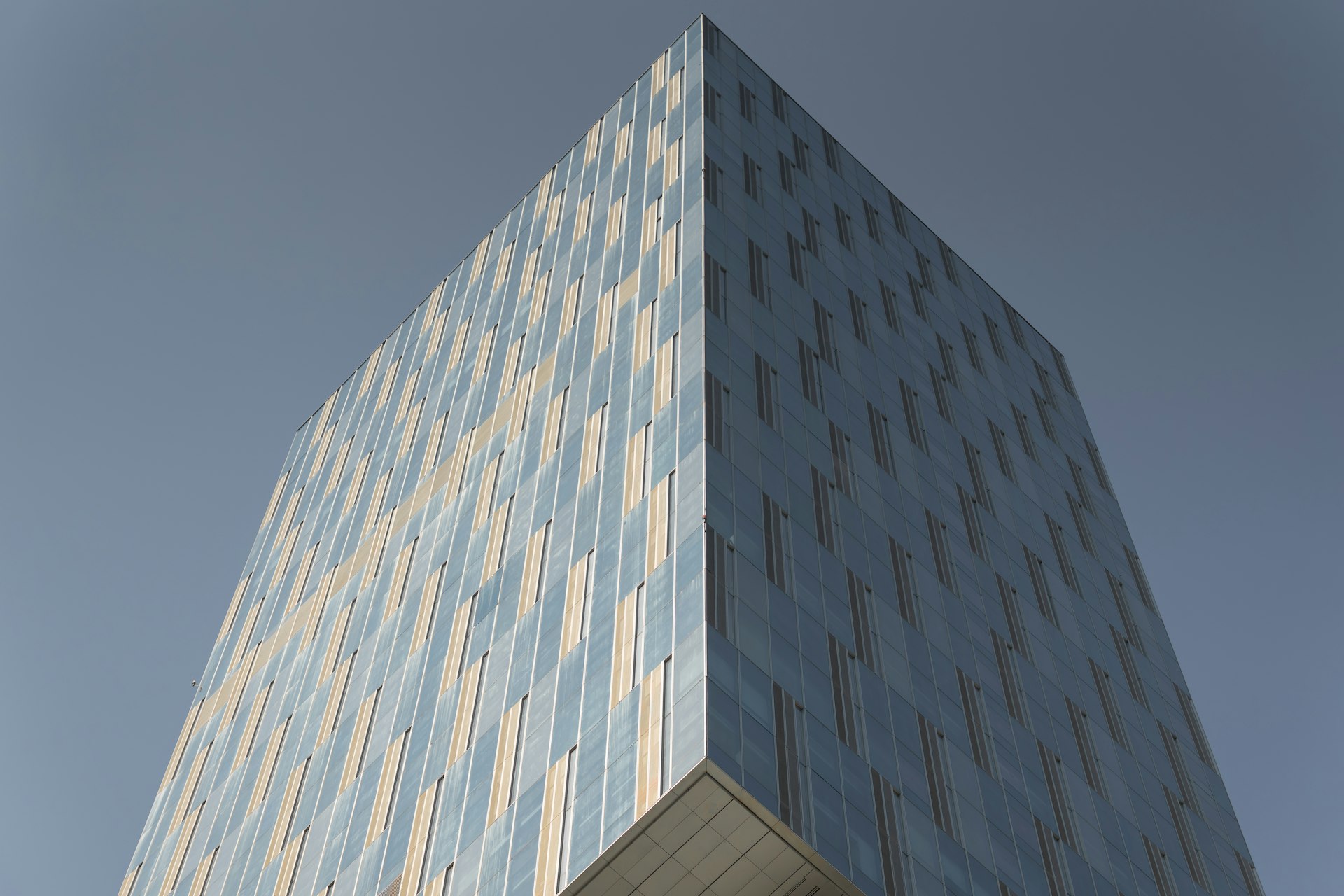 Modern skyscraper reflecting sunlight