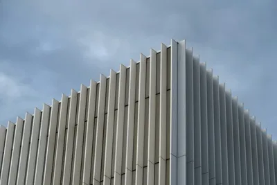 Modern office building under blue sky