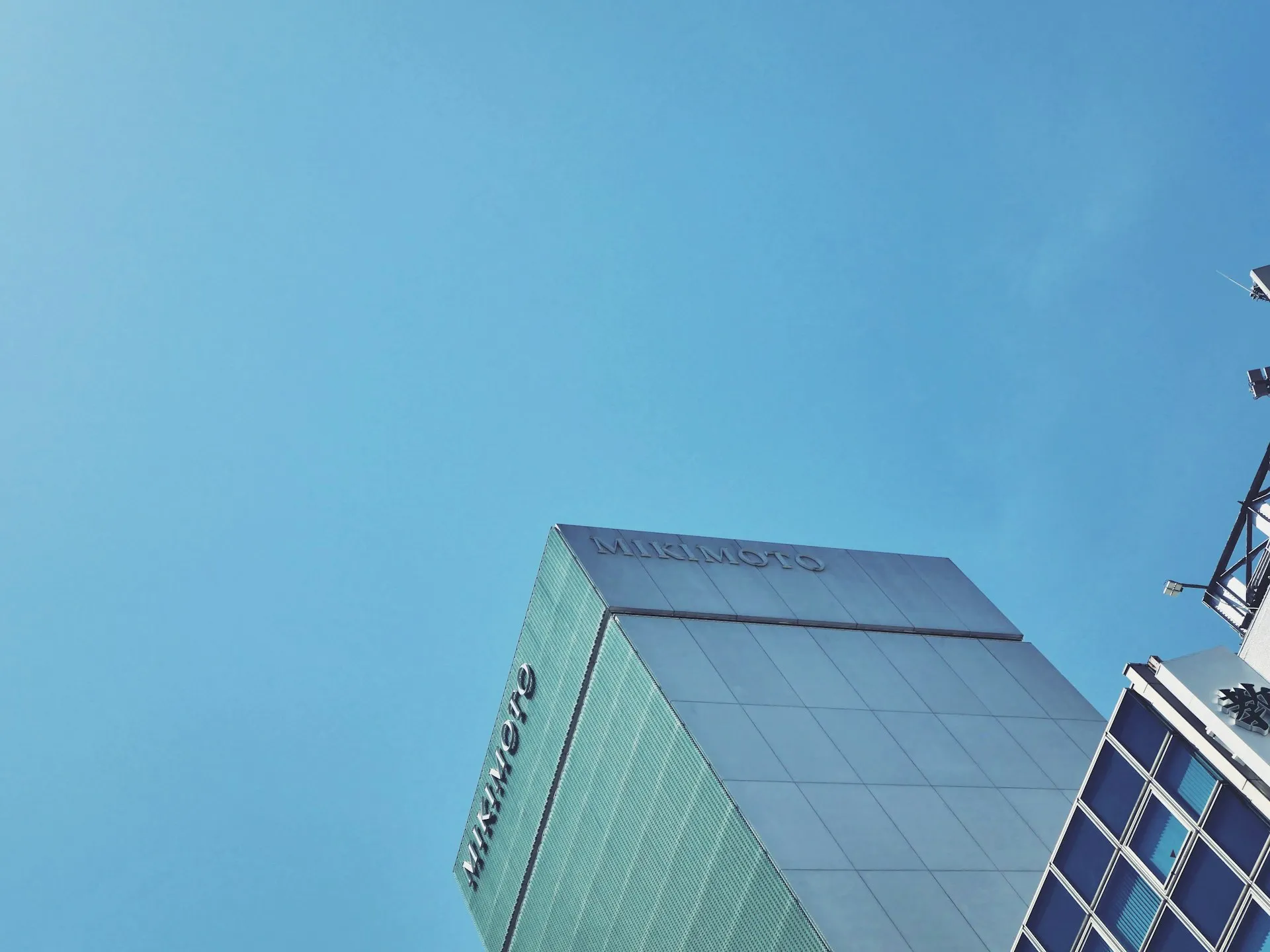 Modern office building under blue sky