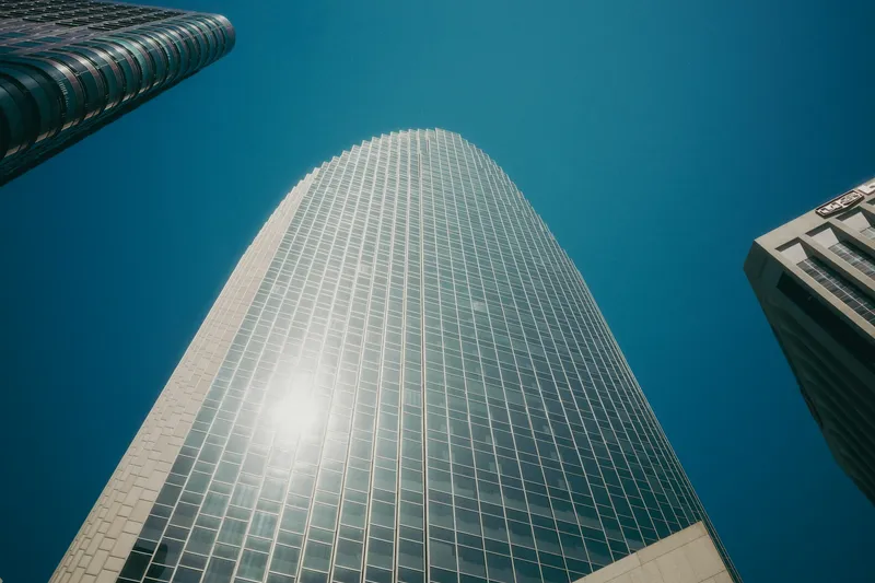 Modern skyscraper reflecting sunlight