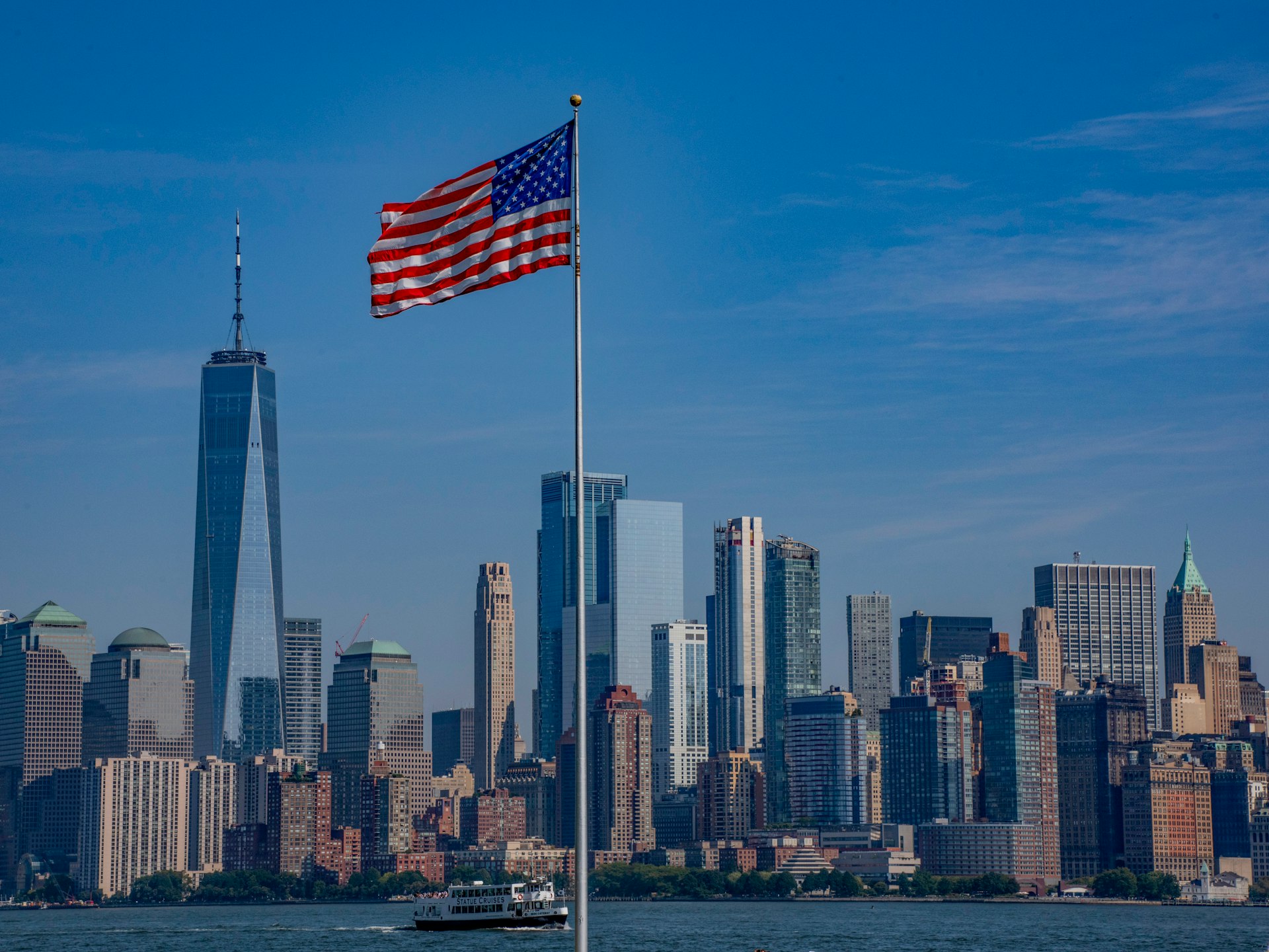 Distant view of a city financial district skyline, illustrating global real estate markets.